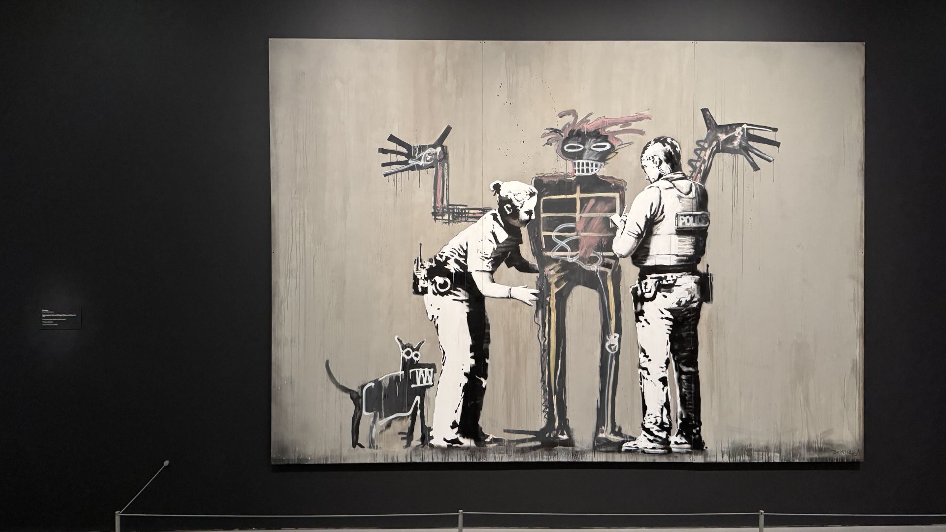 "Banksquiat. Boy and Dog in Stop and Search" by Banksy (2018), Basquiat × Banksy exhibition, Hirshhorn Museum and Sculpture Garden